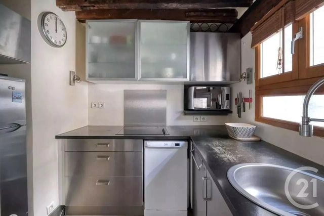 Afficher la photo en grand Appartement Duplex à vendre - 2 pièces - 45.0 m2 - PARIS - 75003 - ILE-DE-FRANCE - Century 21 Lutèce Immobilier